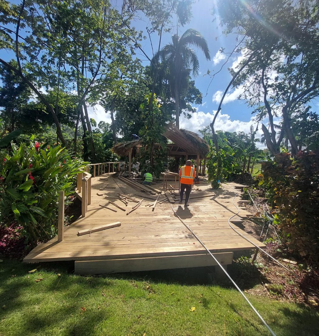 The finished deck under the trees