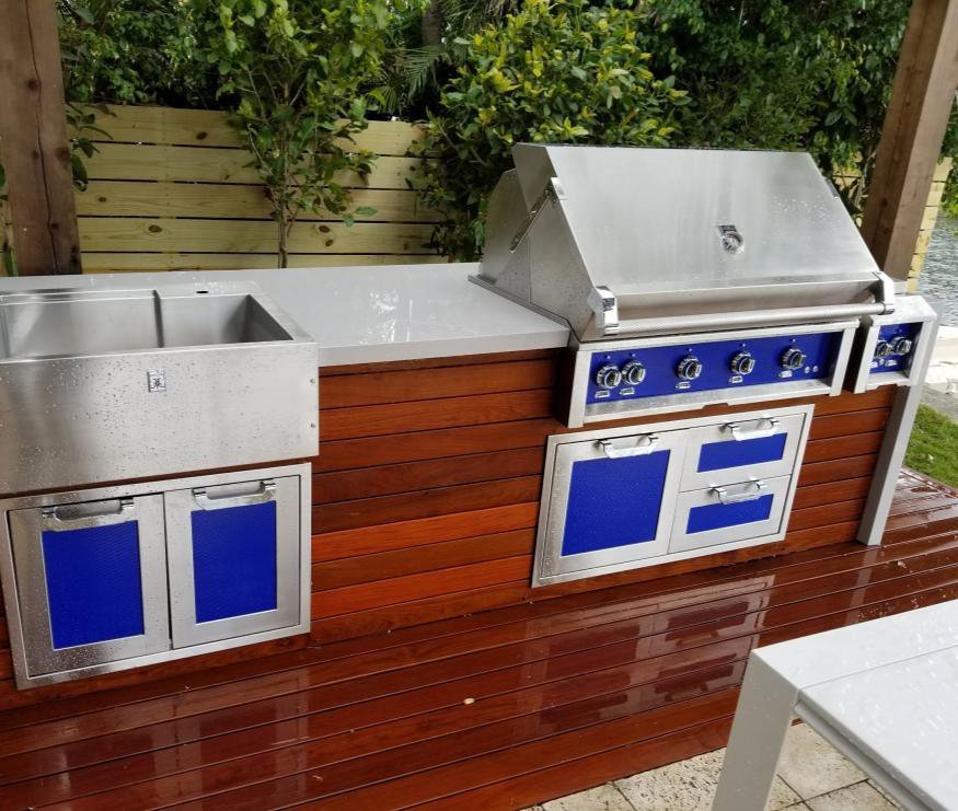 An outdoor kitchen clad in Ipe hardwood